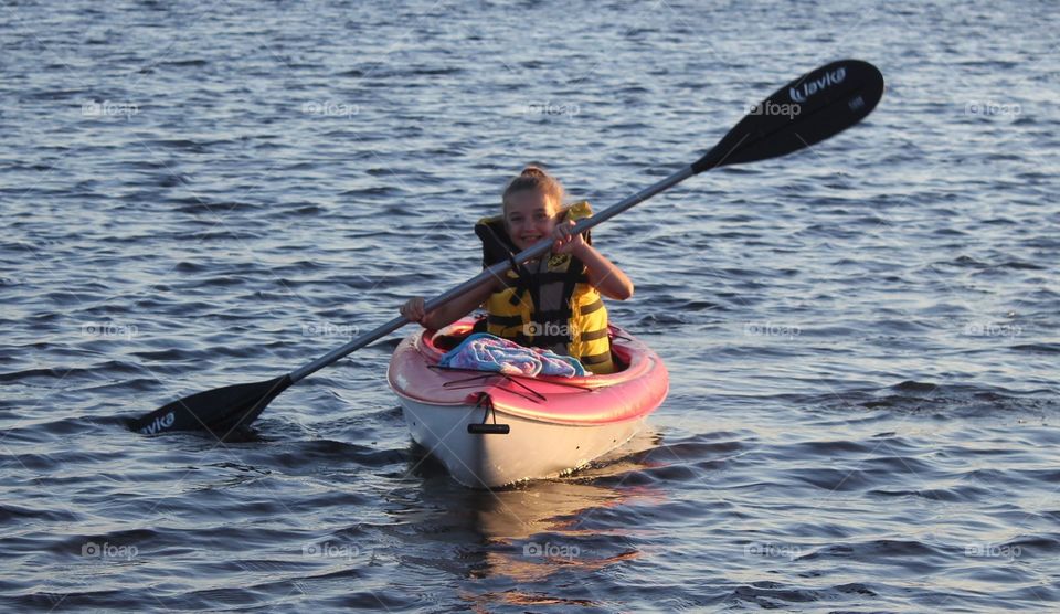 Small girl kayaking