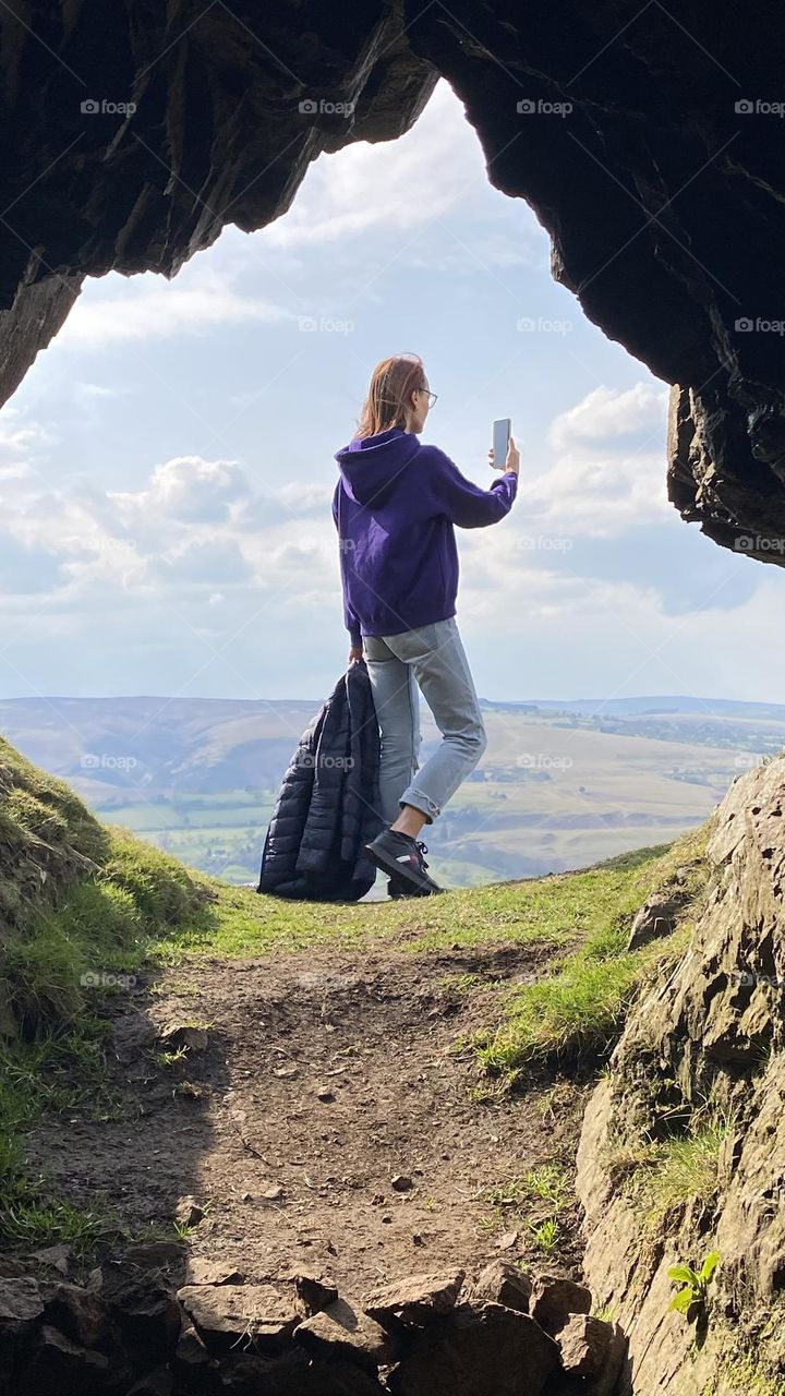 People and smartphone. Woman take photo on smartphone. Amazing view, beautiful nature.