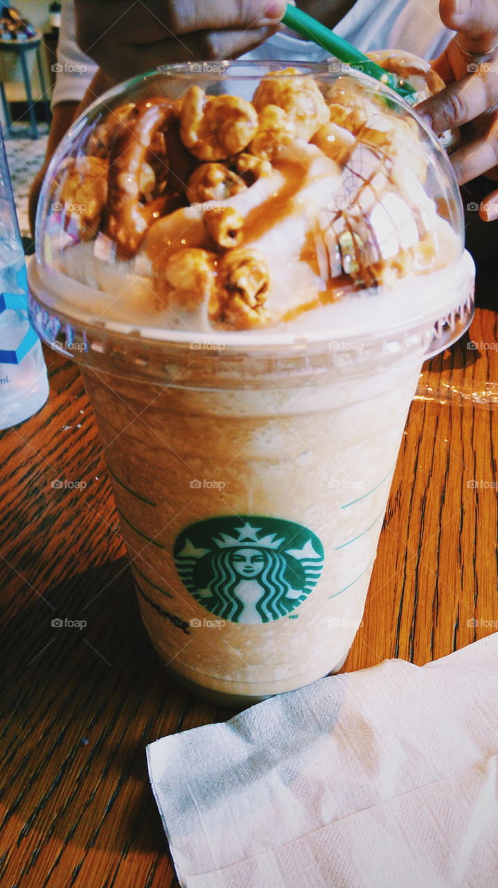 Took this picture last year. It wad a very hot day and my mother and I saw a nearby Starbucks. My Mom and I ordered the same flavor as it was new that time. It was a great bonding time with me and my mom. Really nothing taste sweeter than a coffe made out of love and drank with tge comfort of a family.