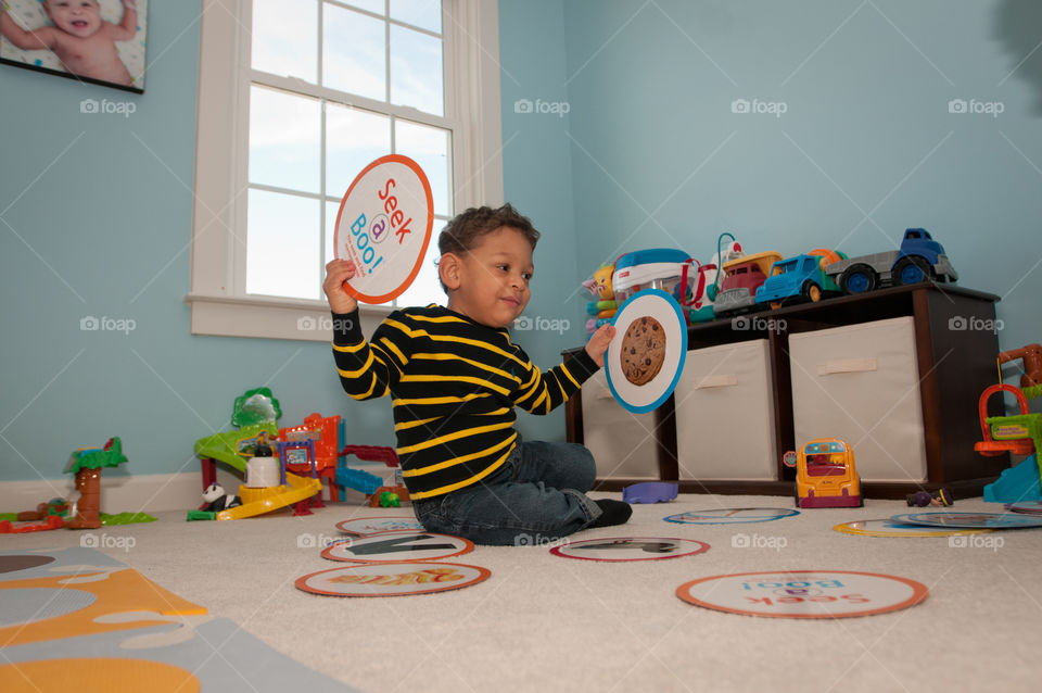 Boy playing in play room