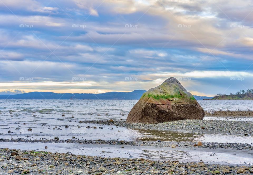 Big rock by the ocean
