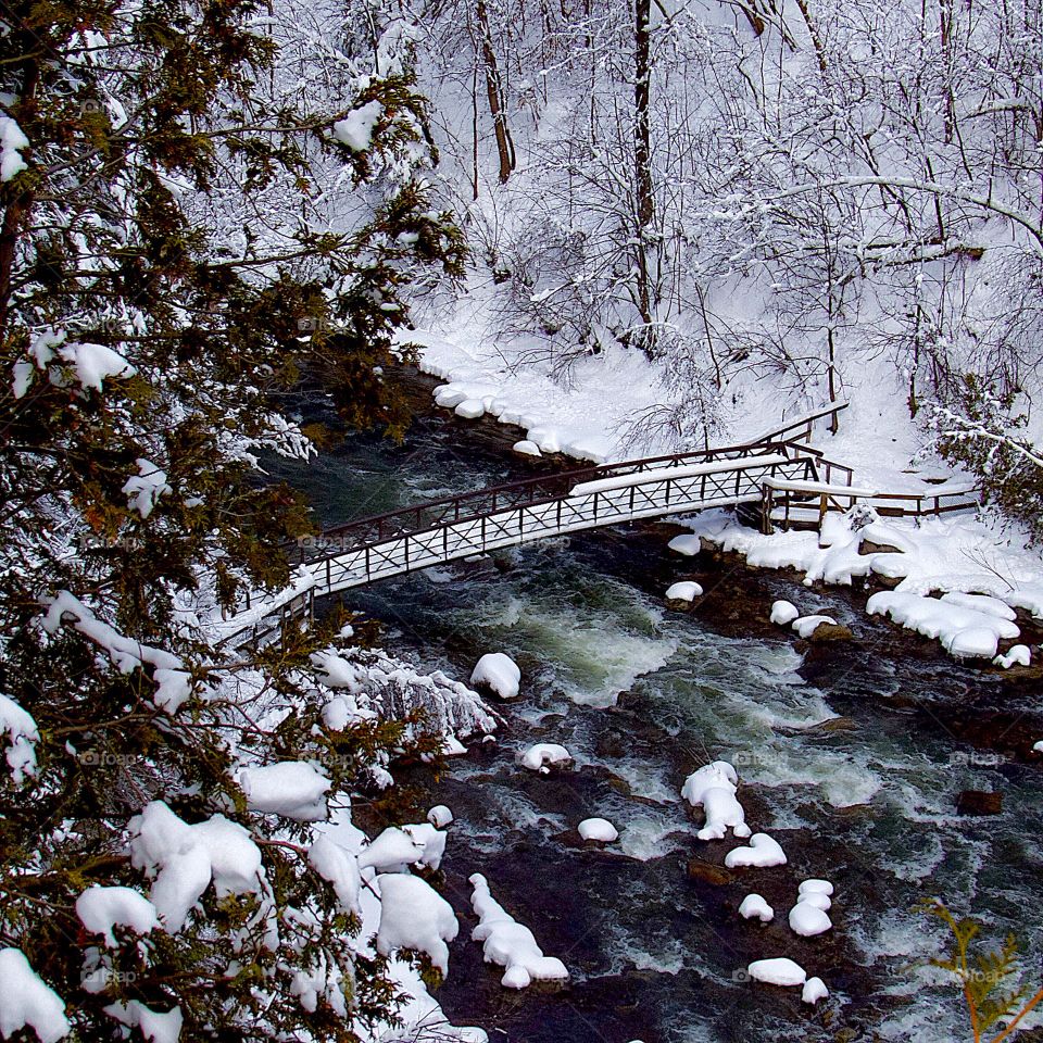 This is the foot bridge at the base of Chittenango Falls Ny.  3 feet of snow fell the night before making the bridge impossible to get to.
