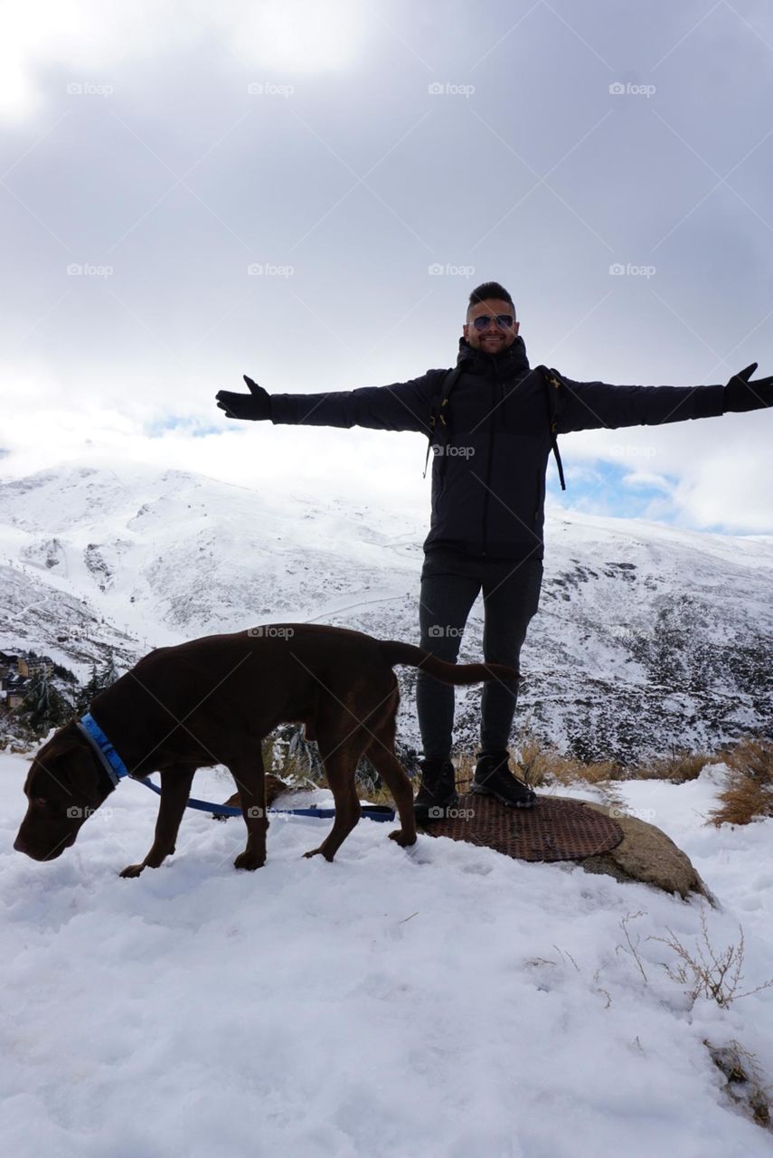 Snow#mountains#human#dog