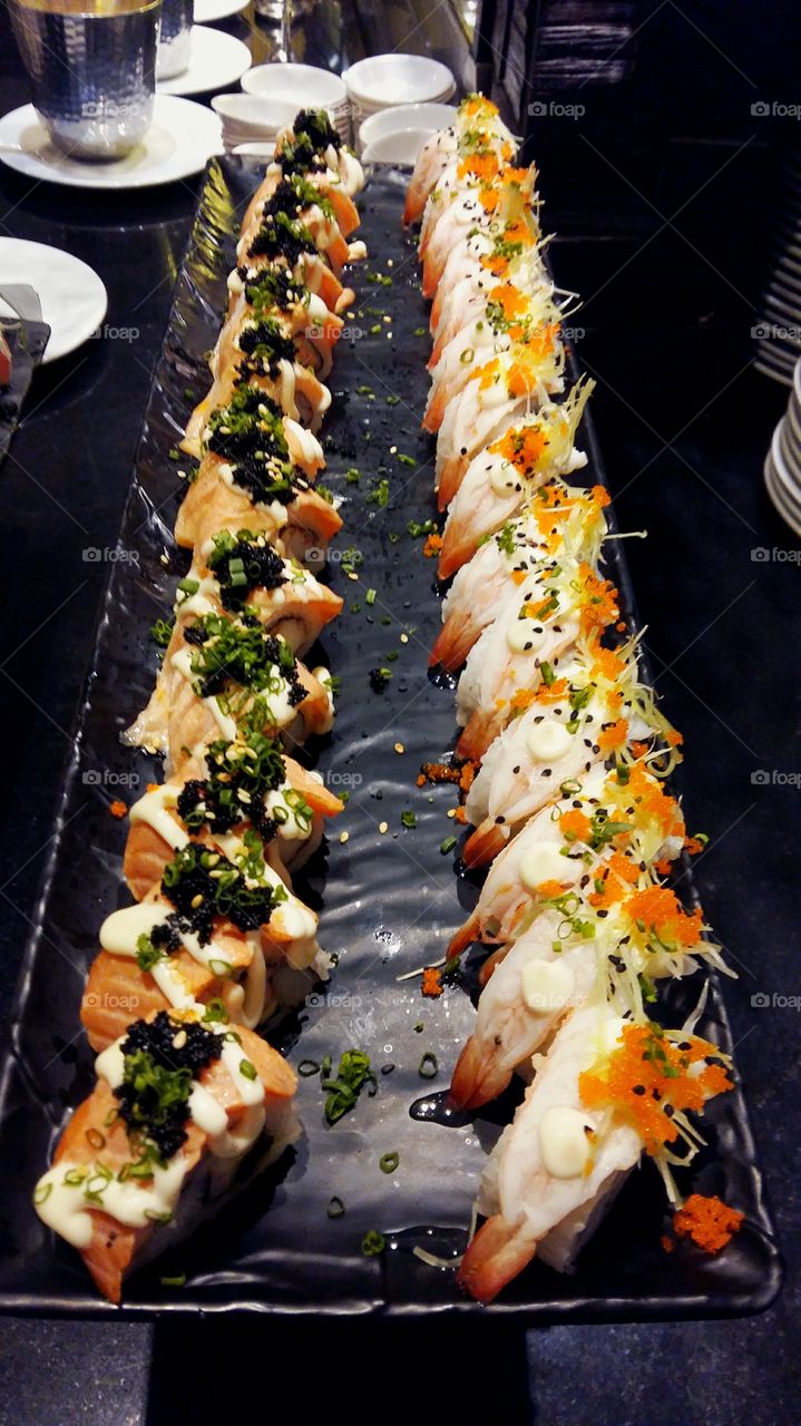 Sushi dish in a row