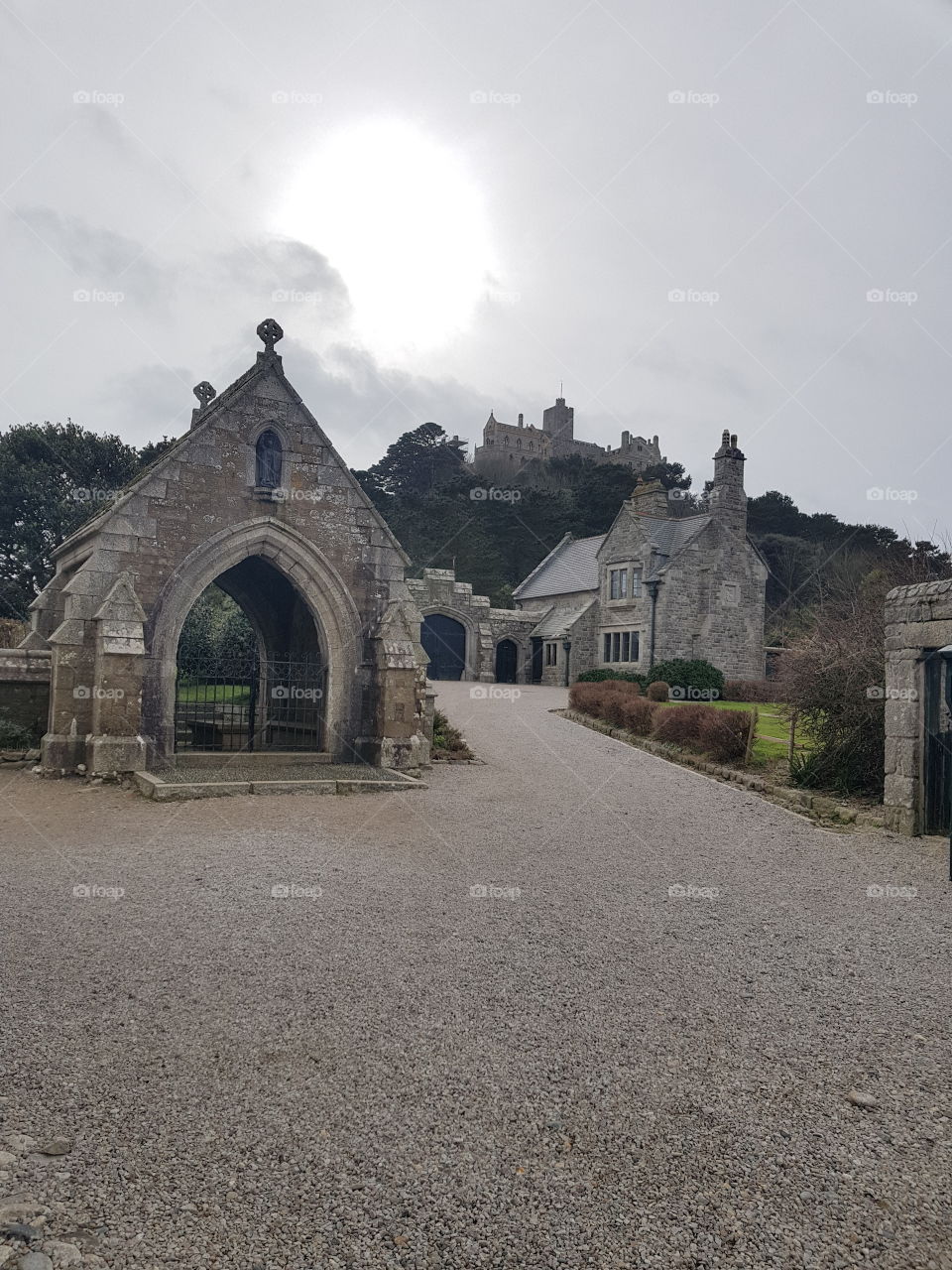 The cloudy day has a strange effect on the sun, magnifying is glow over this ancient city by the sea.