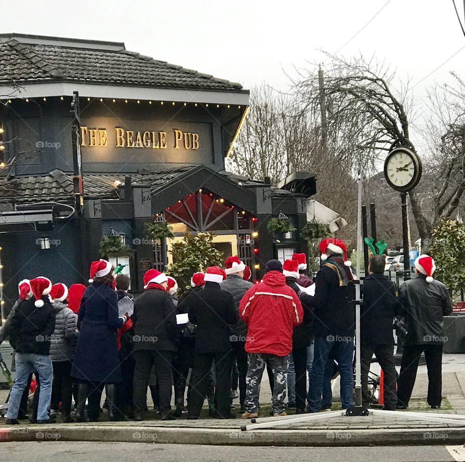Hoard of people in Santa hats headed to the pub for Christmas cheer 