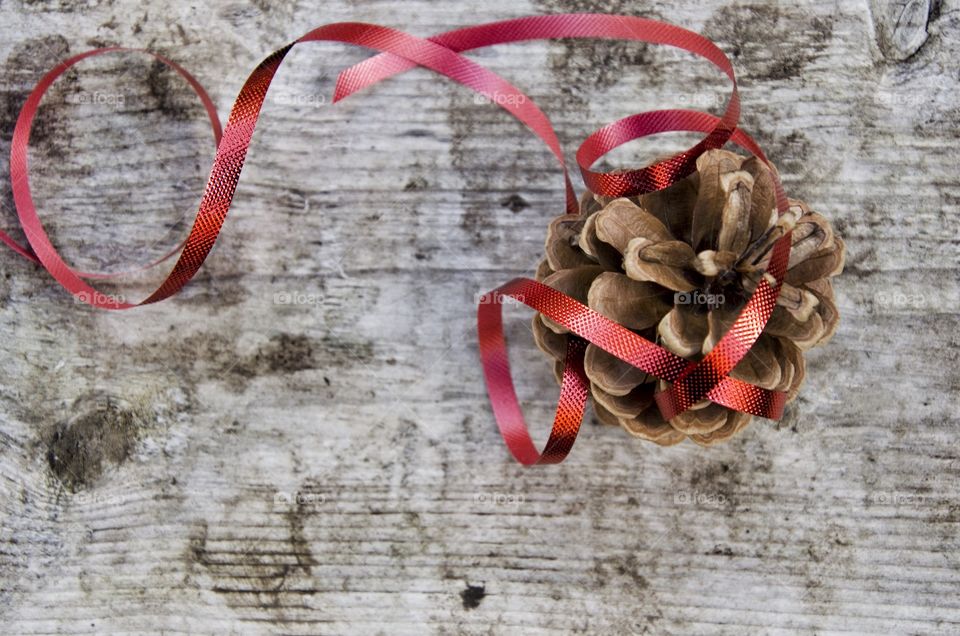 Pine Cone Ornament . Get crafty during the holidays and make your own Christmas ornaments from nature!