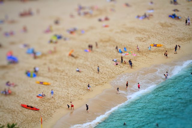 Beach Activites. A busy beach full of holidaymakers having fun and keeping active and healthy. Birds eye view.