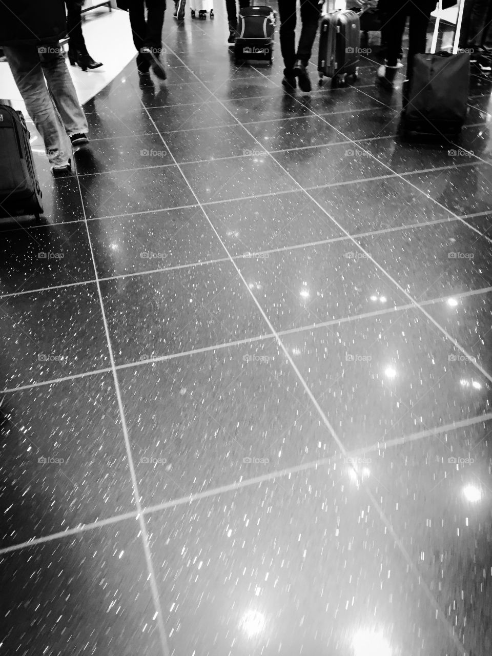 Lights reflecting on tiled floor