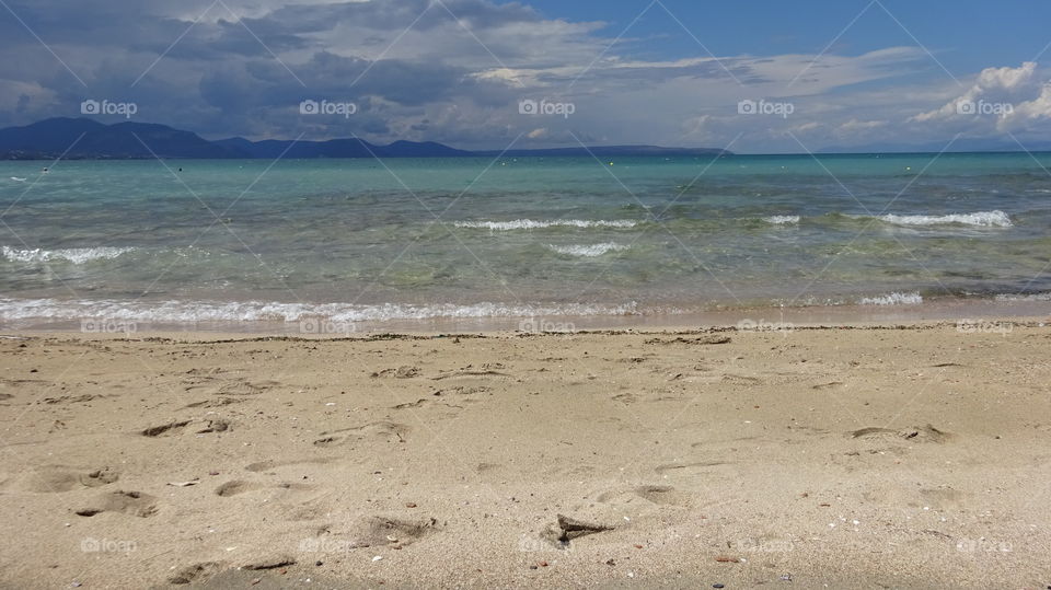 Scenic view of a sea against cloudy sky
