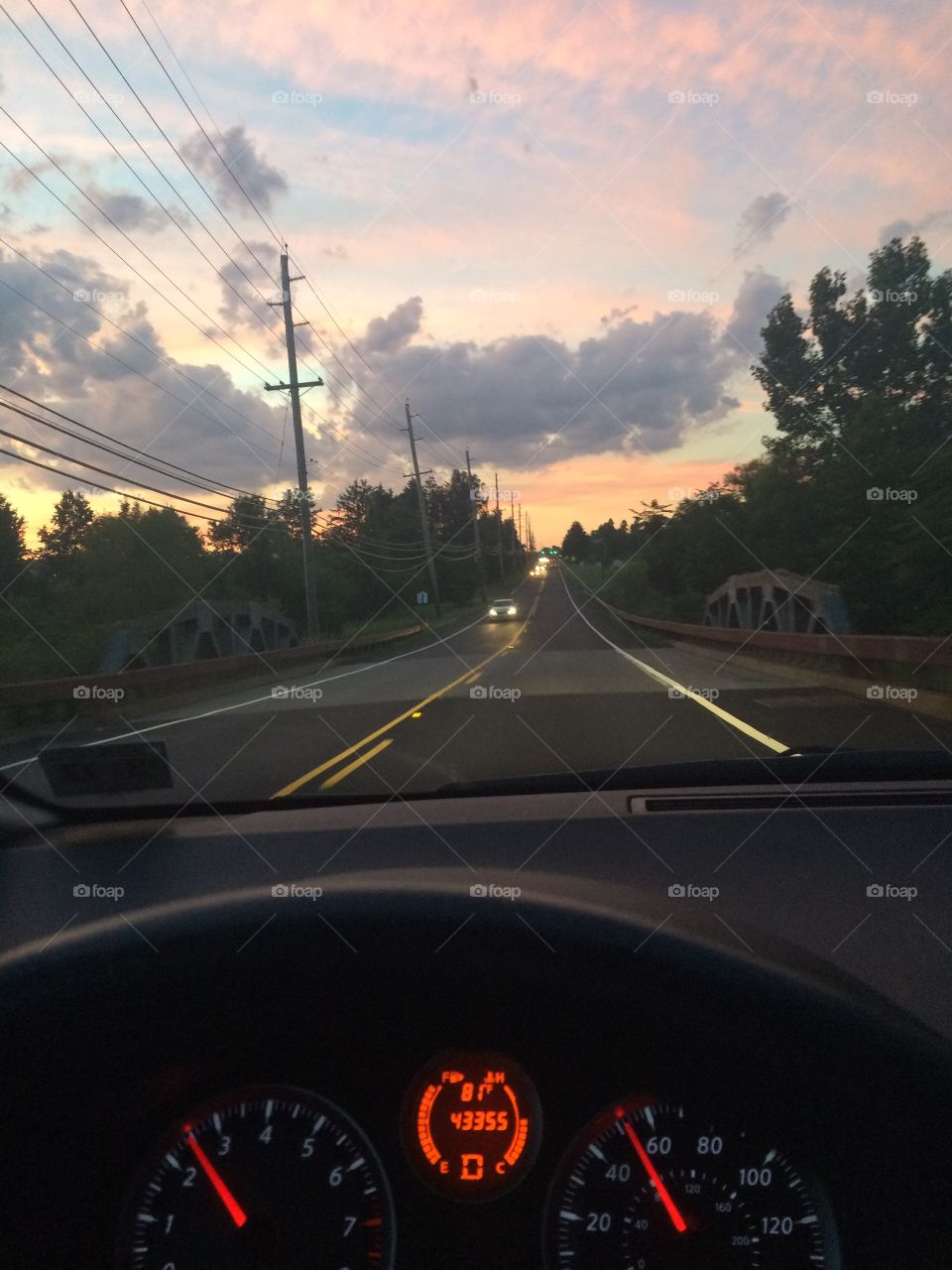Driving through a sunset 