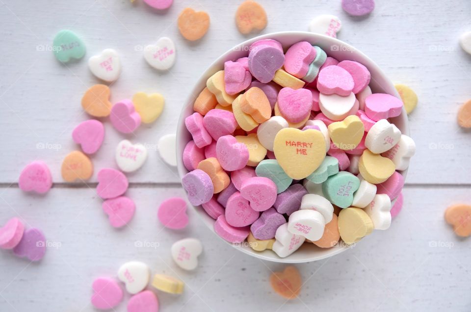 Bowl of Candy Hearts with a message on top