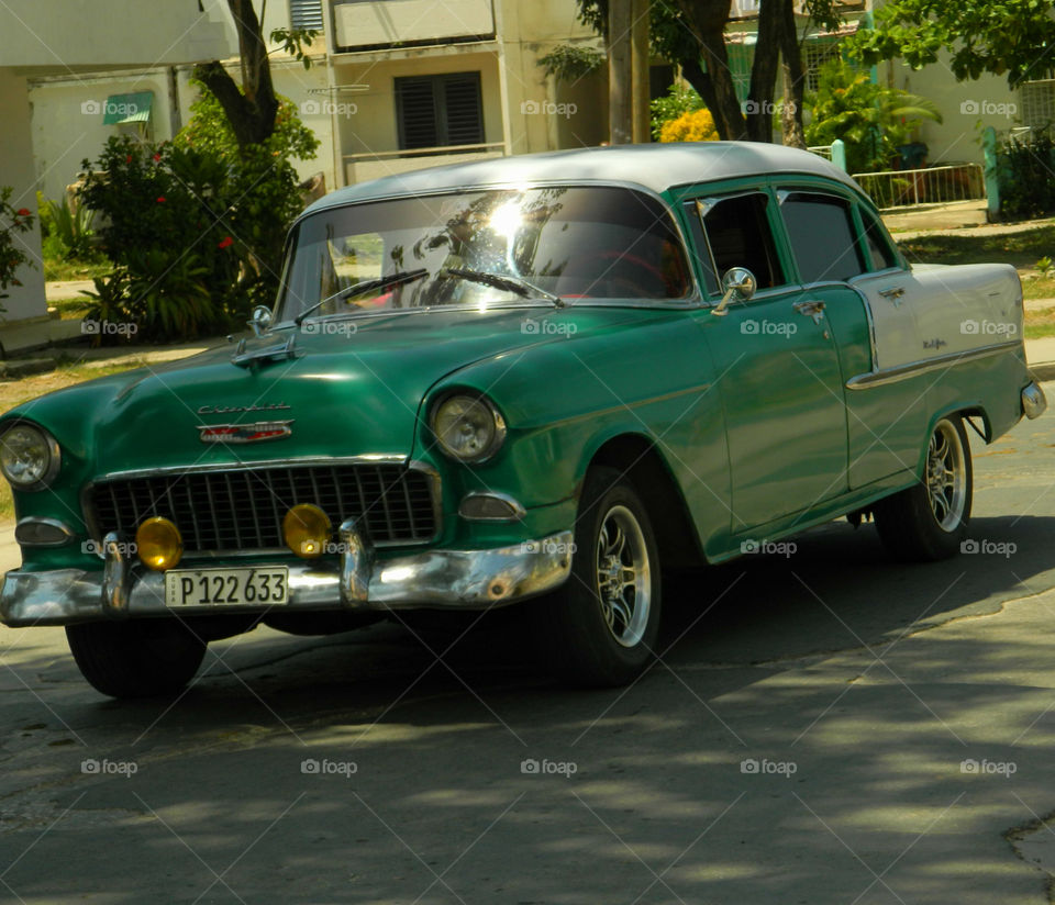 1955 Chevy Belair in the streets of Santiago de Cuba!
Two door ,two tone,1955 Chevy Belair being driven on the streets in Cuba!
