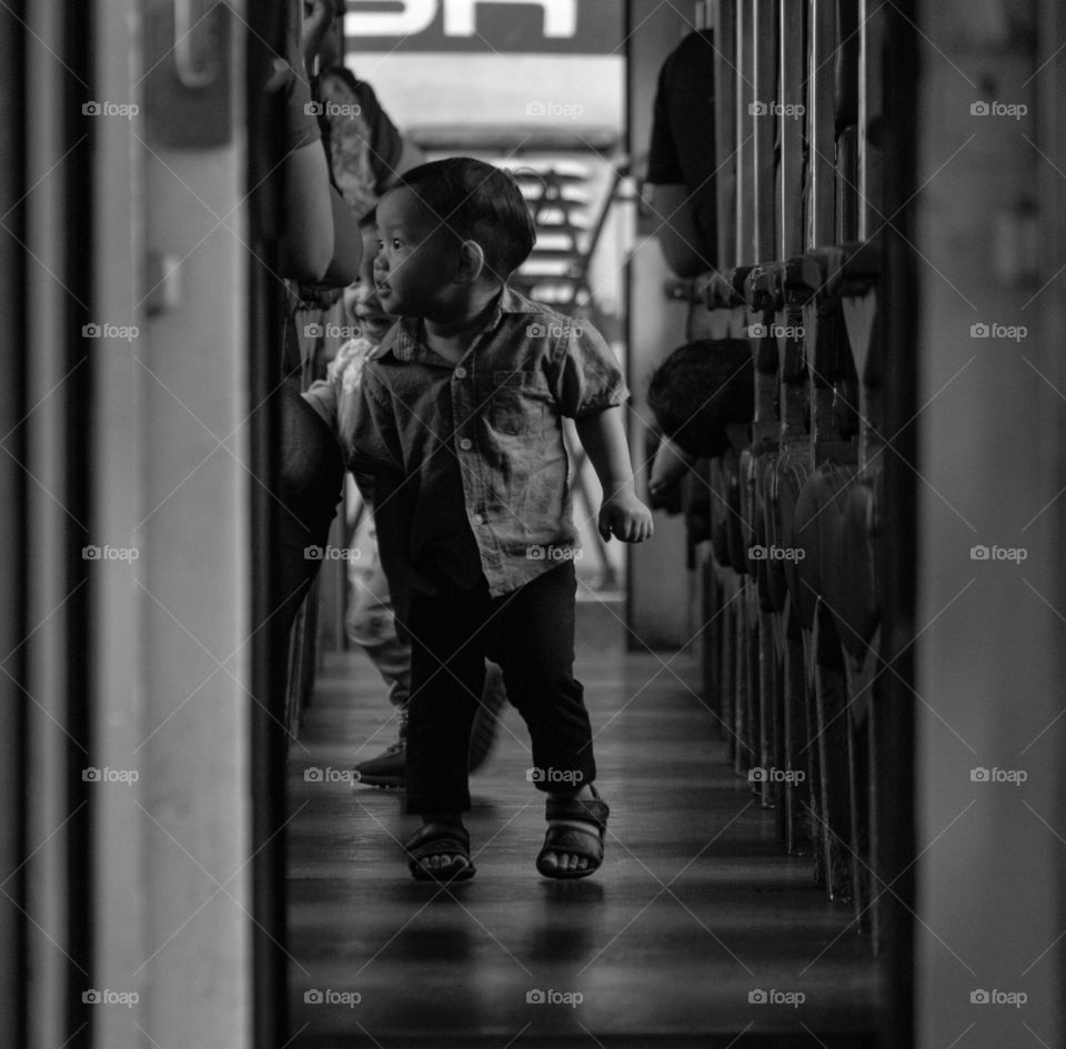 Kids play on the local train