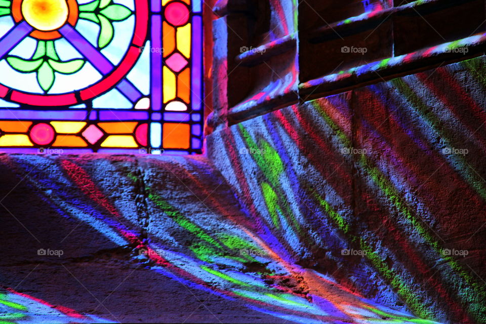 multi color reflection on the ancient wall