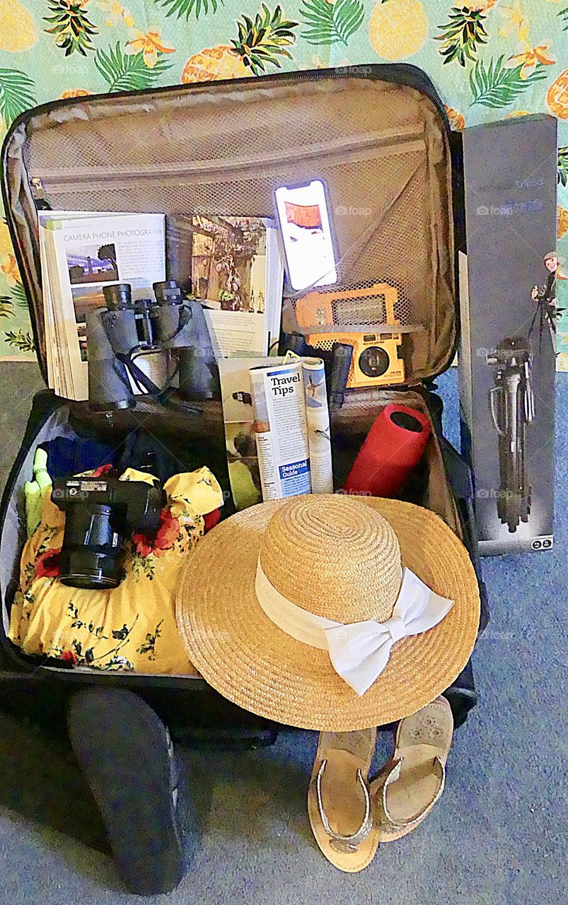 Suitcase for holiday- “I think I have everything I need for this much needed vacation- if not I’ll purchase it when I get there