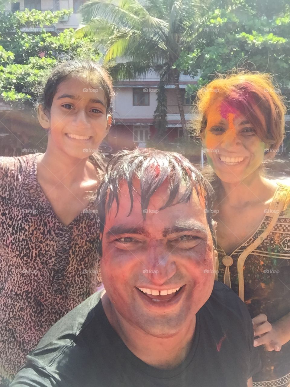 Enjoying Holi colourful festival 