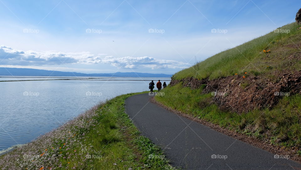 People hiking on the coast