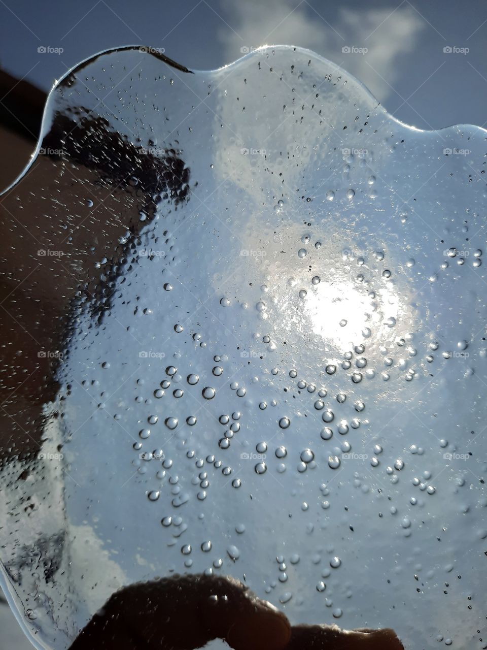 ice plate ...and...sun behind ...
bubbles inside ice plate