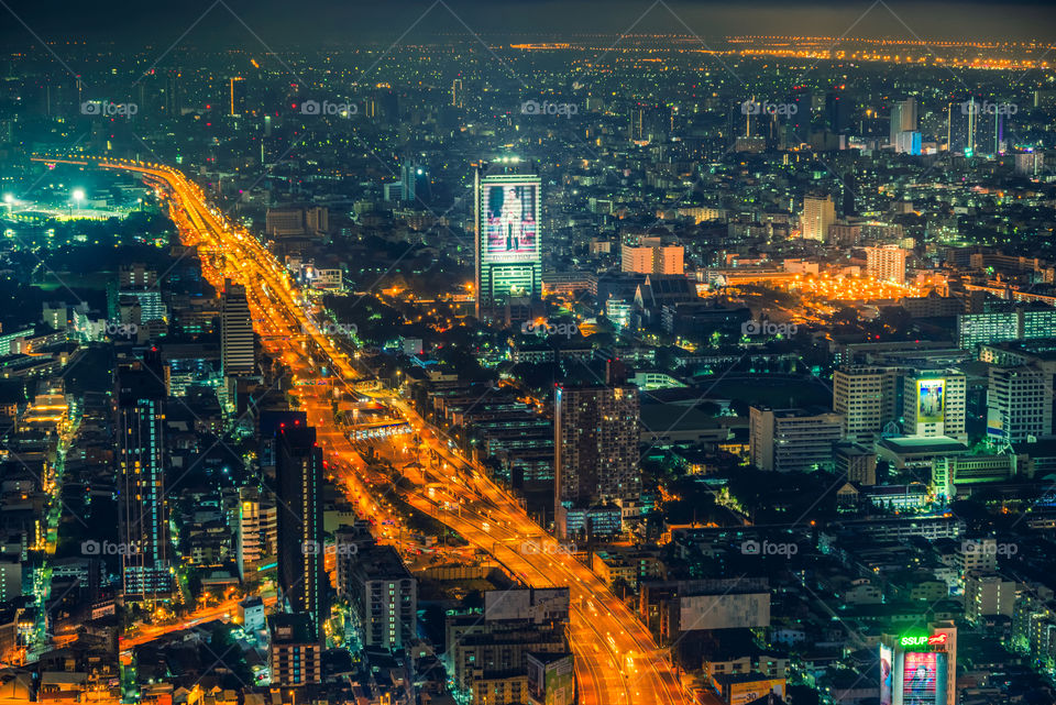 Thailand-November 21 2020:Misty conditions covered the skyscraper in the night after heavy rain in Bangkok