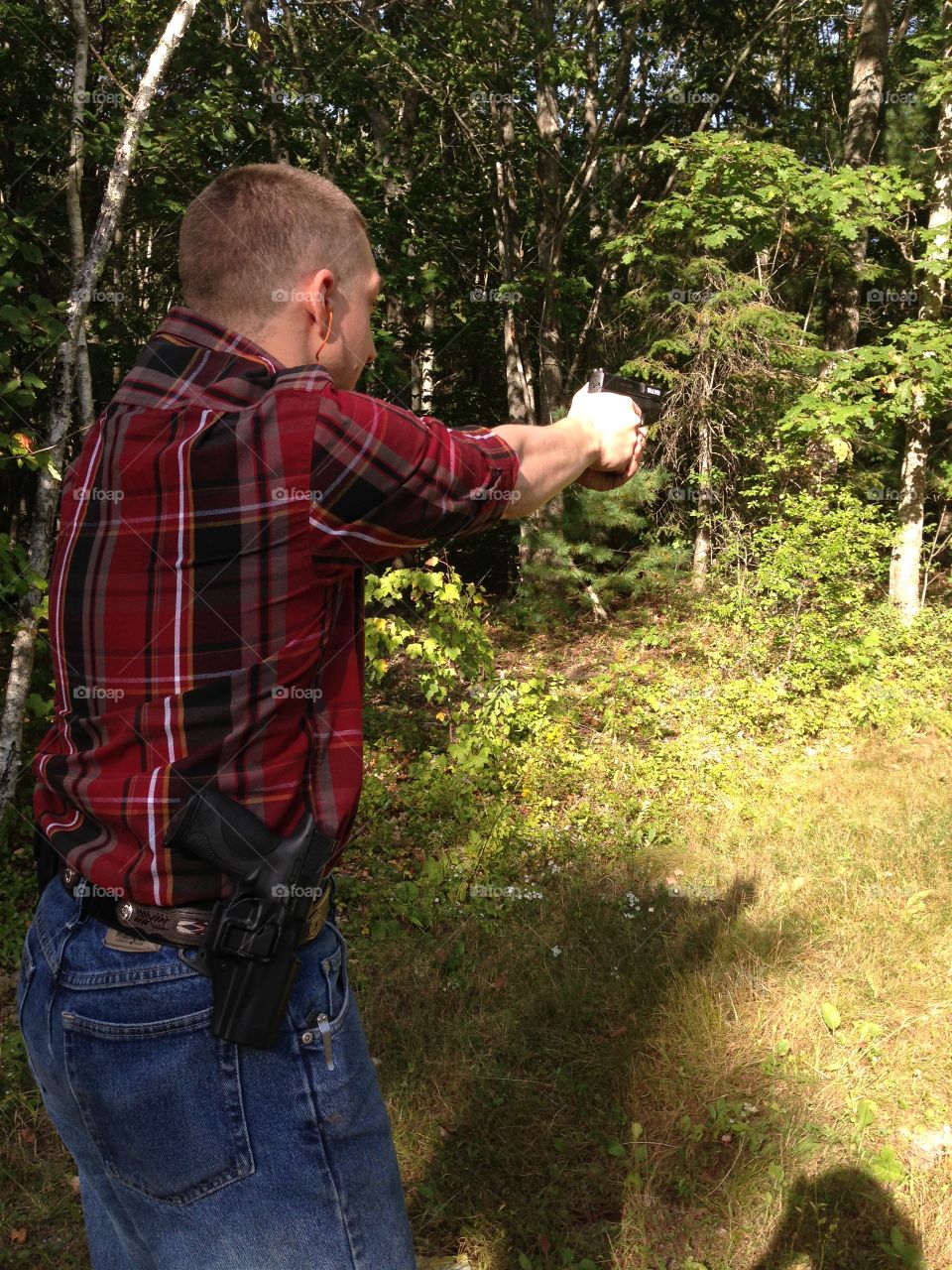 My husband shooting the S&W Shield 