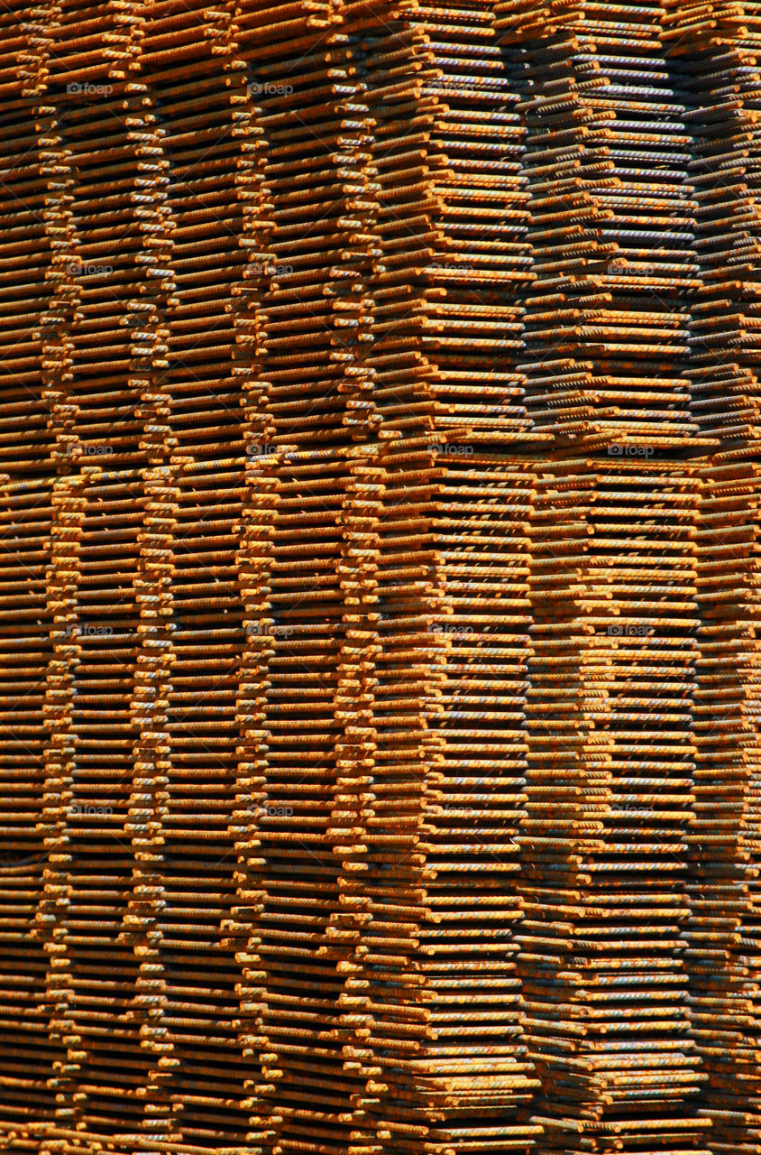 stack of rusty steel construction mats, close-up