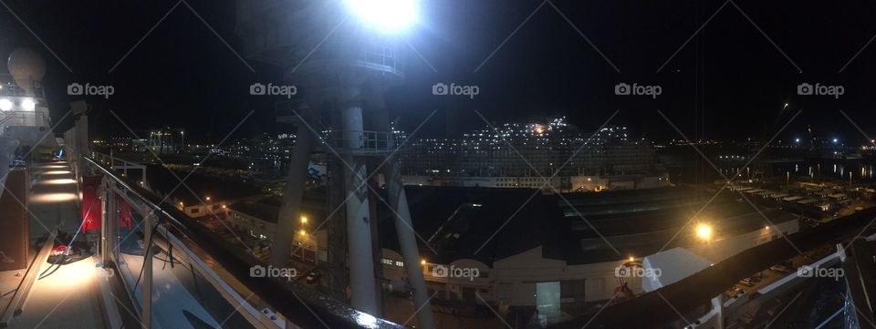 Ship shipyard night construction port build cruise ship nighttime lights crane work worker Fincantieri 