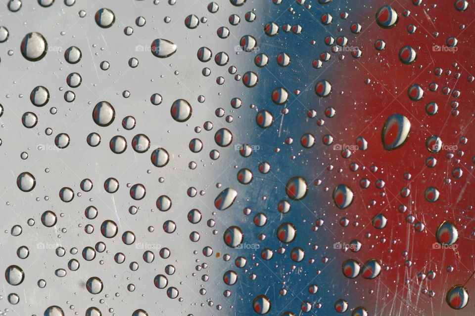 Drops on plastic reflected