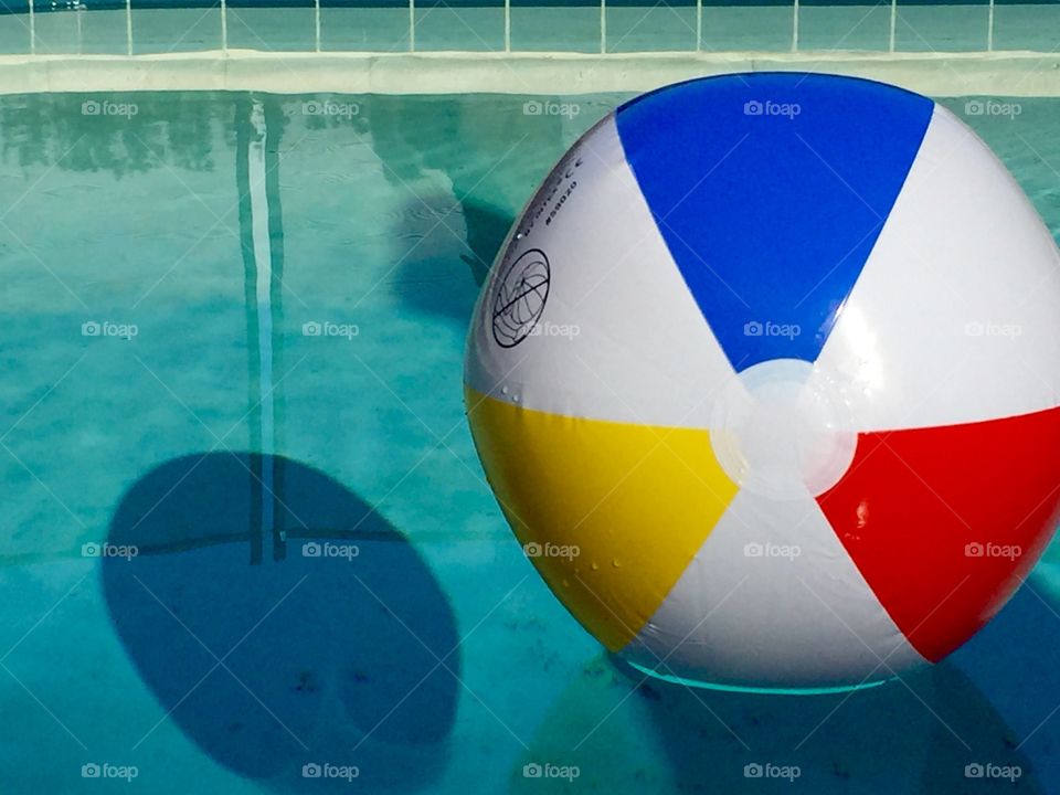 Beach ball in pool