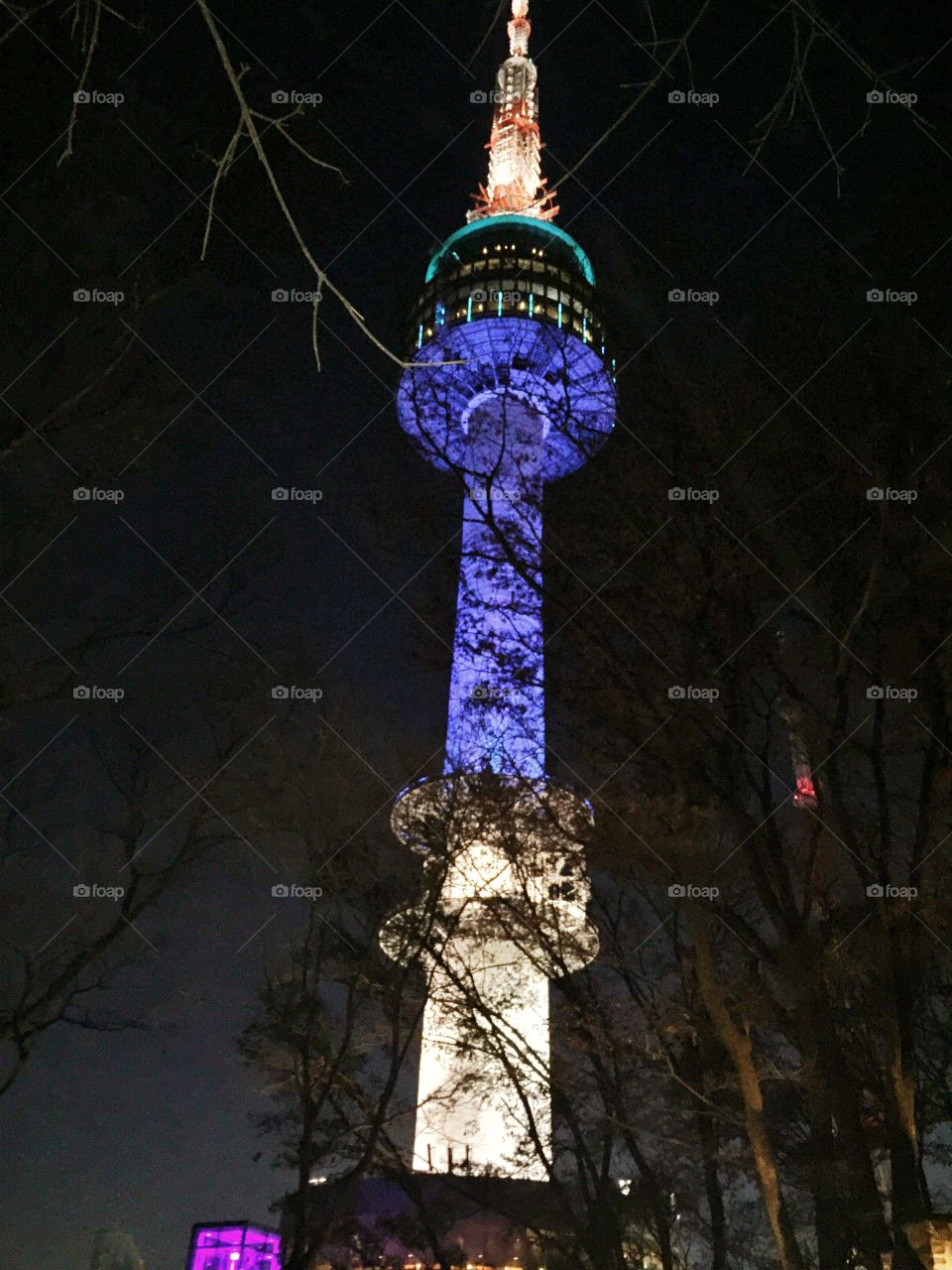Seoul Tower. Pictures taken late afternoon. visible colored lights illuminate the tower