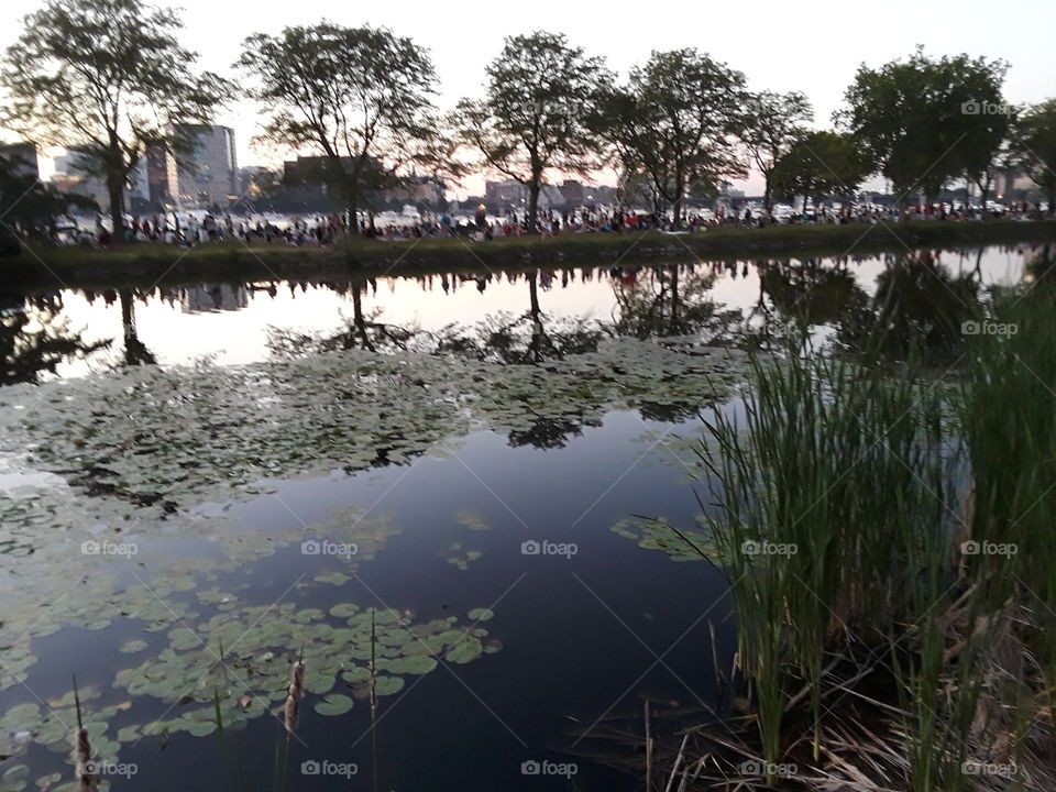 Sunset at the Esplanada Charles River Boston MA on 4th of July celebration at the Esplanada -