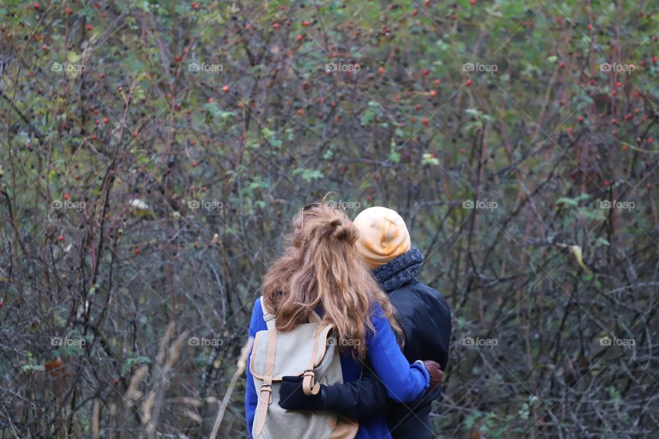 Couple from behind, woman with long hair 