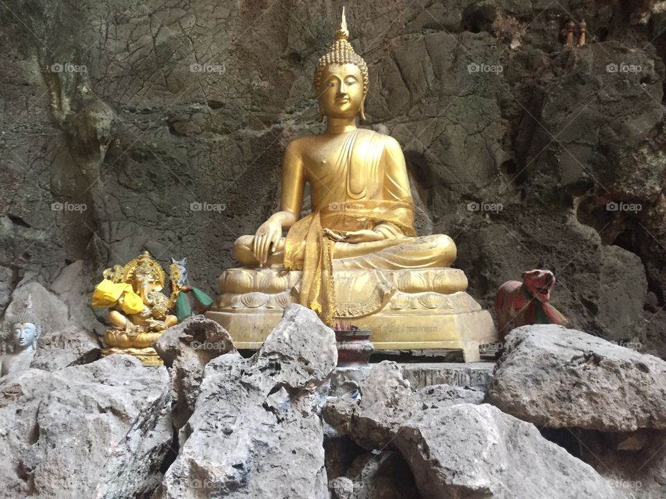 One of many Buddha statues in the underground temple of phetchaburri Thailand