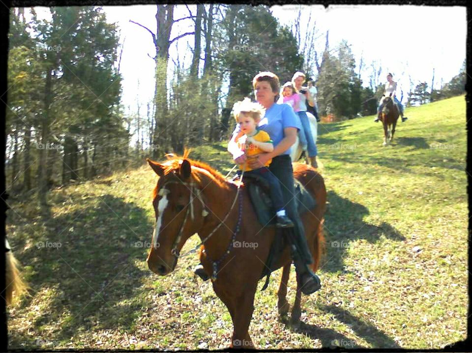 Trail ride. Tristan riding with OMA
