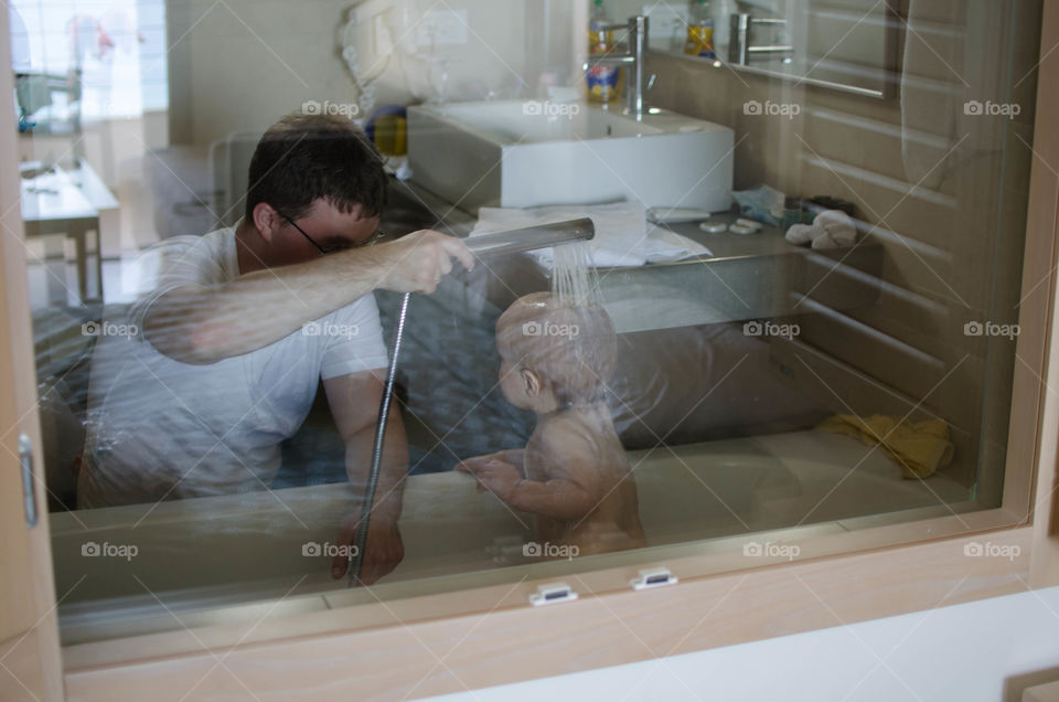 Having shower with daddy