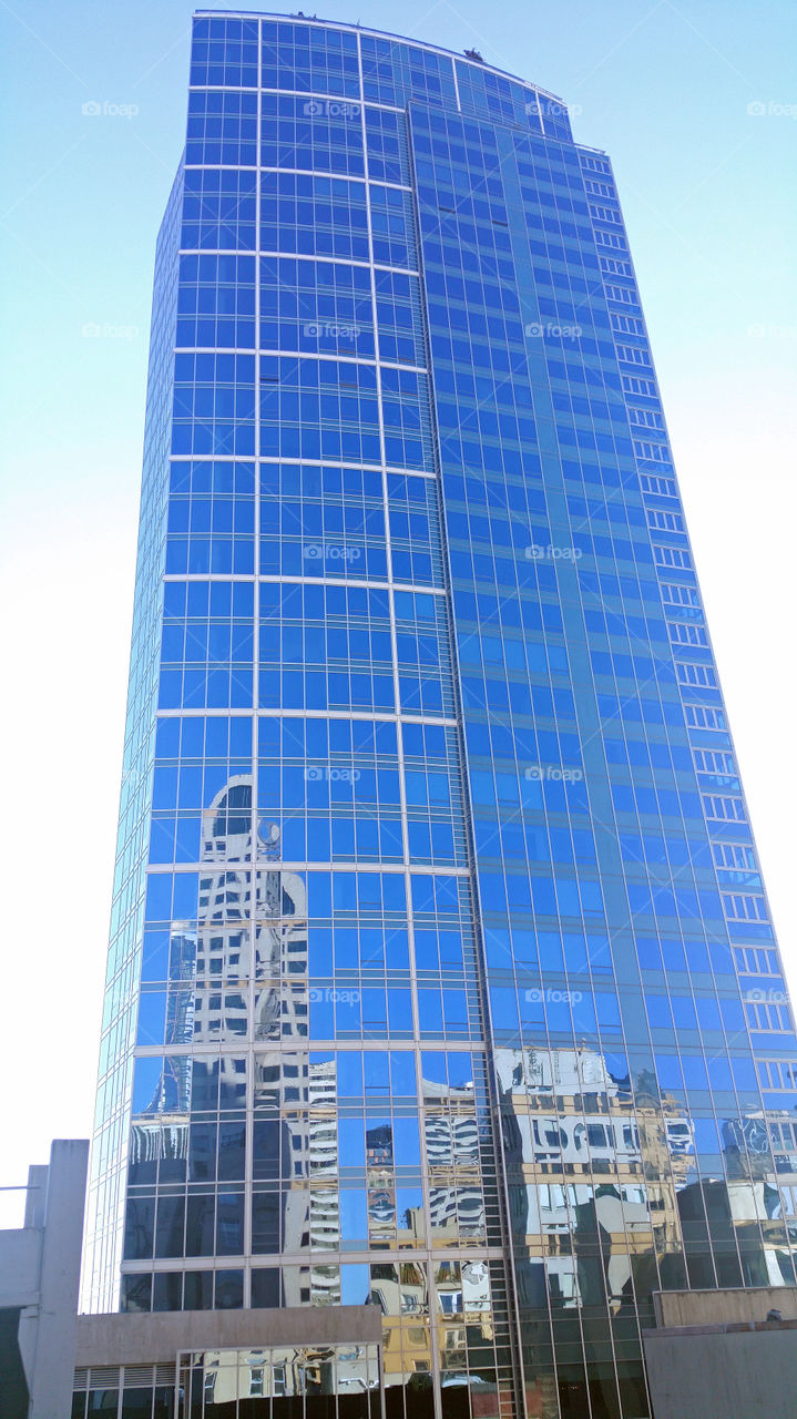 Reflection of buildings in the glass of a skyscraper in Seattle Washington