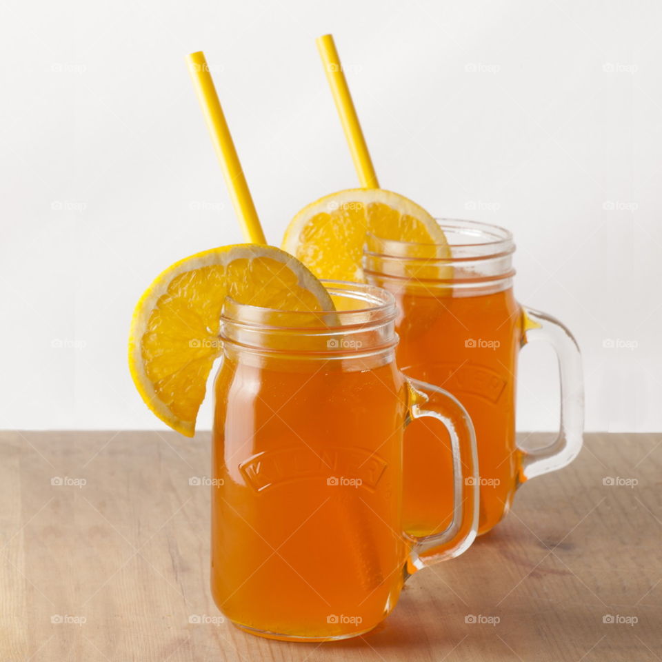 Studio shot of orange juice in jar