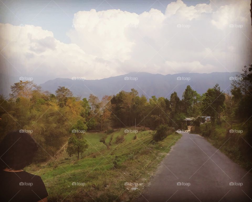 where the clouds and the hills meet
This is my friend enjoying the view of the hills and the clouds covering them.
This is taken in the village of Pedong, West Bengal.