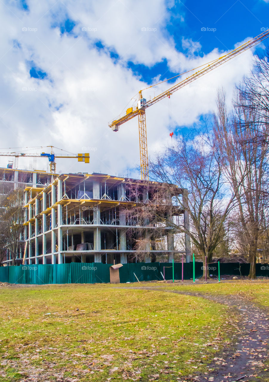 building process with crane on long exposure