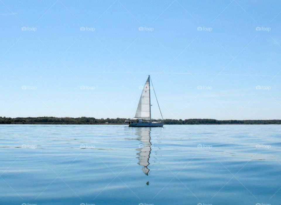 Sailing on Chesapeake Bay. sailboat and reflections on the Chesapeake Bay on Maryland's Eastern Shore