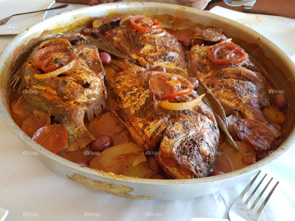 Moroccan fish cooking food