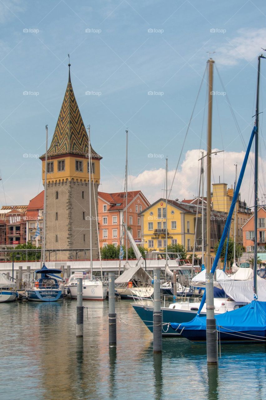 Boats moored at harbor