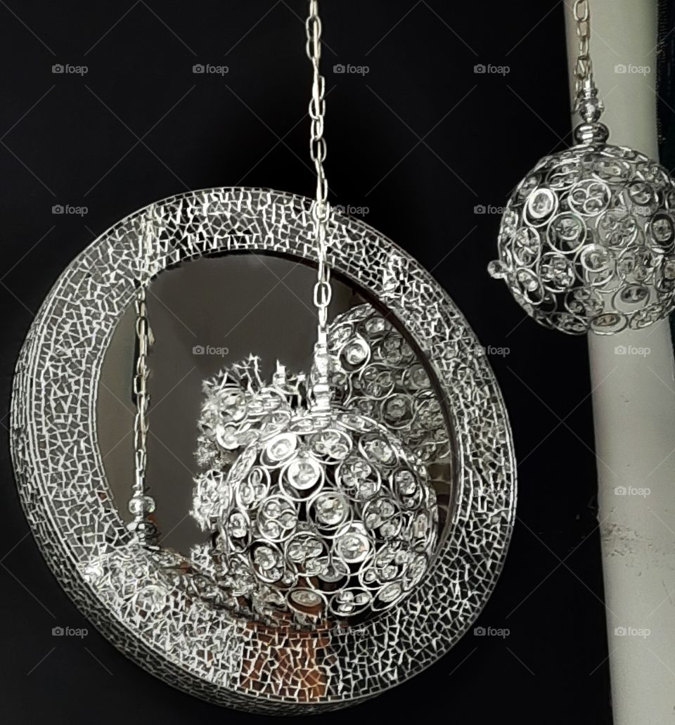 mirror,hanging chandelier architecture,wall,look,black,silver,house,city,colorful,landscape