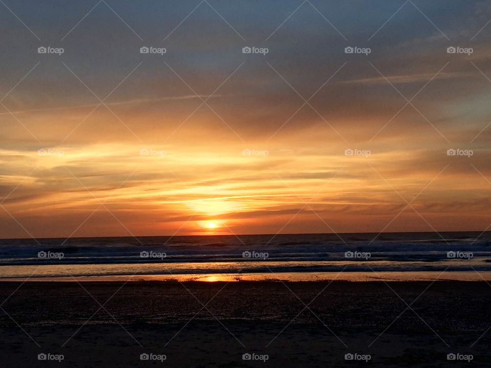 Beach sunset . Photo was taken Lincoln city Oregon at d sands beach 