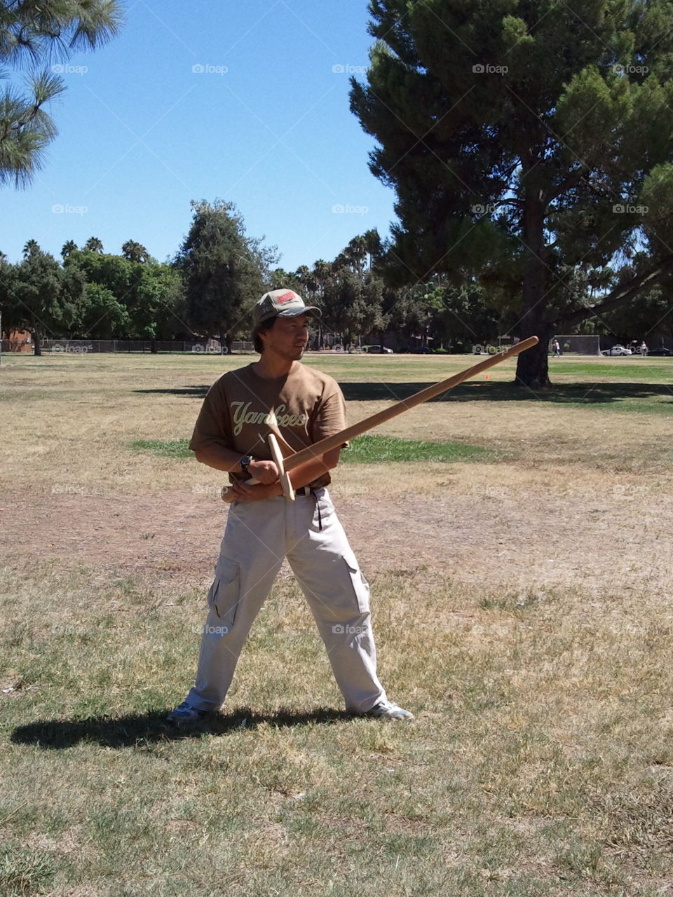 Standing in a Longsword guard with a wooden waster. This is an integral part of training in the German medieval art of longsword combat.