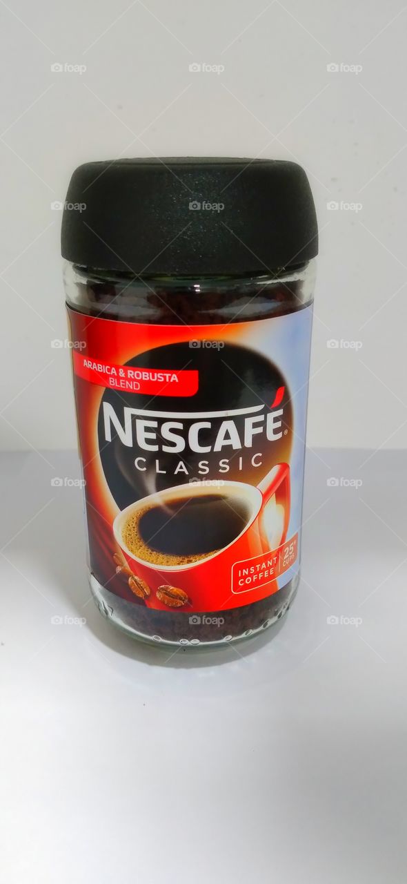 A bottle of Nescafe.
