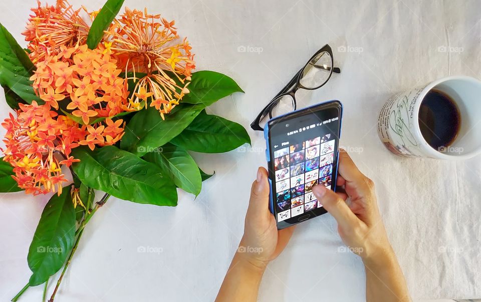 woman surfing on her smartphone or cellphone