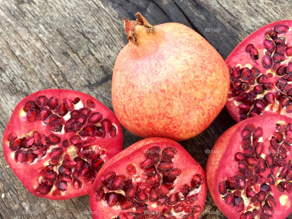 Pomegranate on wooden table