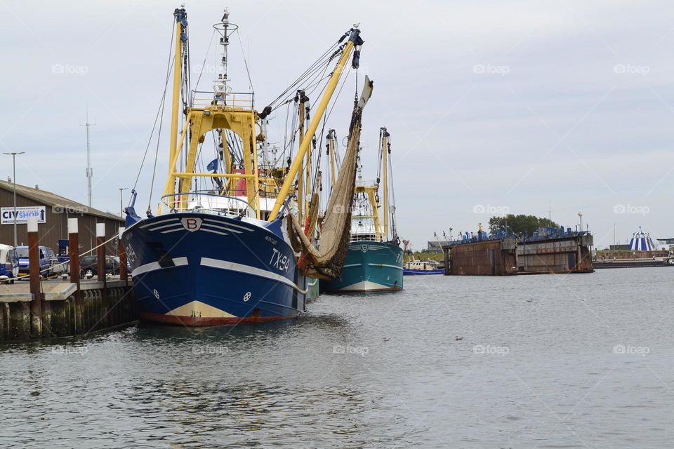 Fishing vessels in harbour.. Waiting to sail the next day.