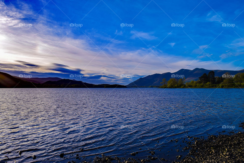 Scenic view of lake at dusk
